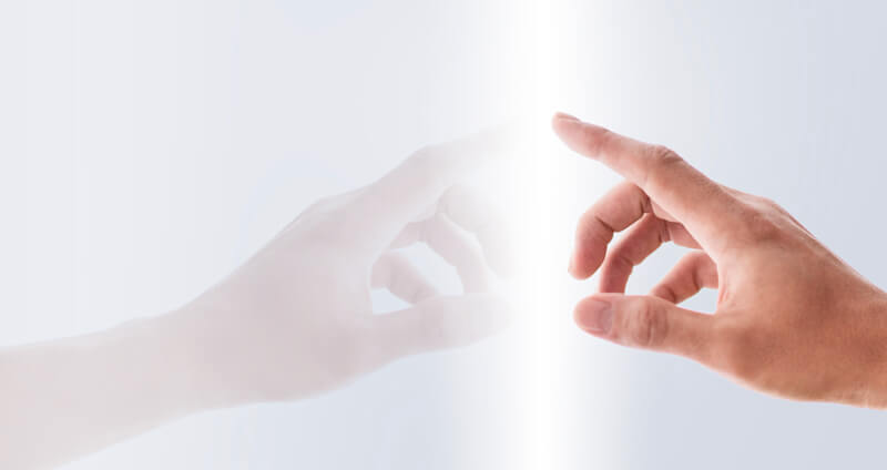 A hand touching a mirror to represent Horizon Controls Group Core Values - Transparancy