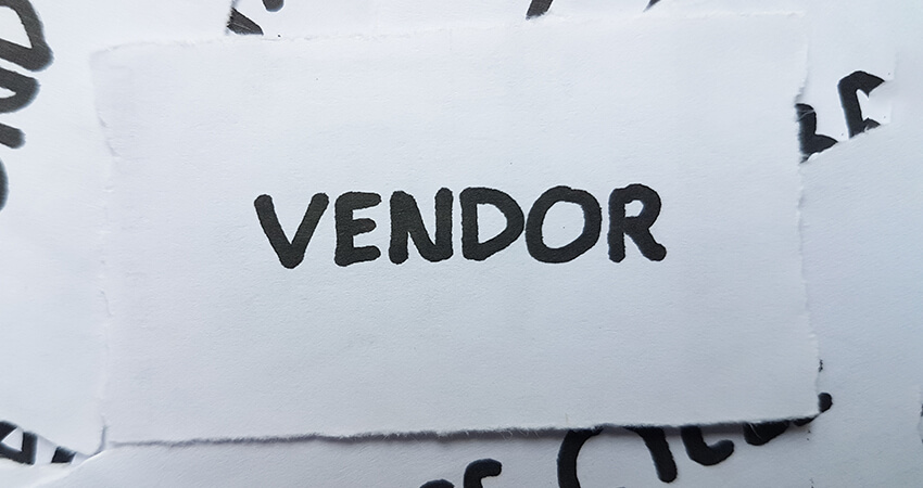 Image of ripped up paper with the word Vendor written on it